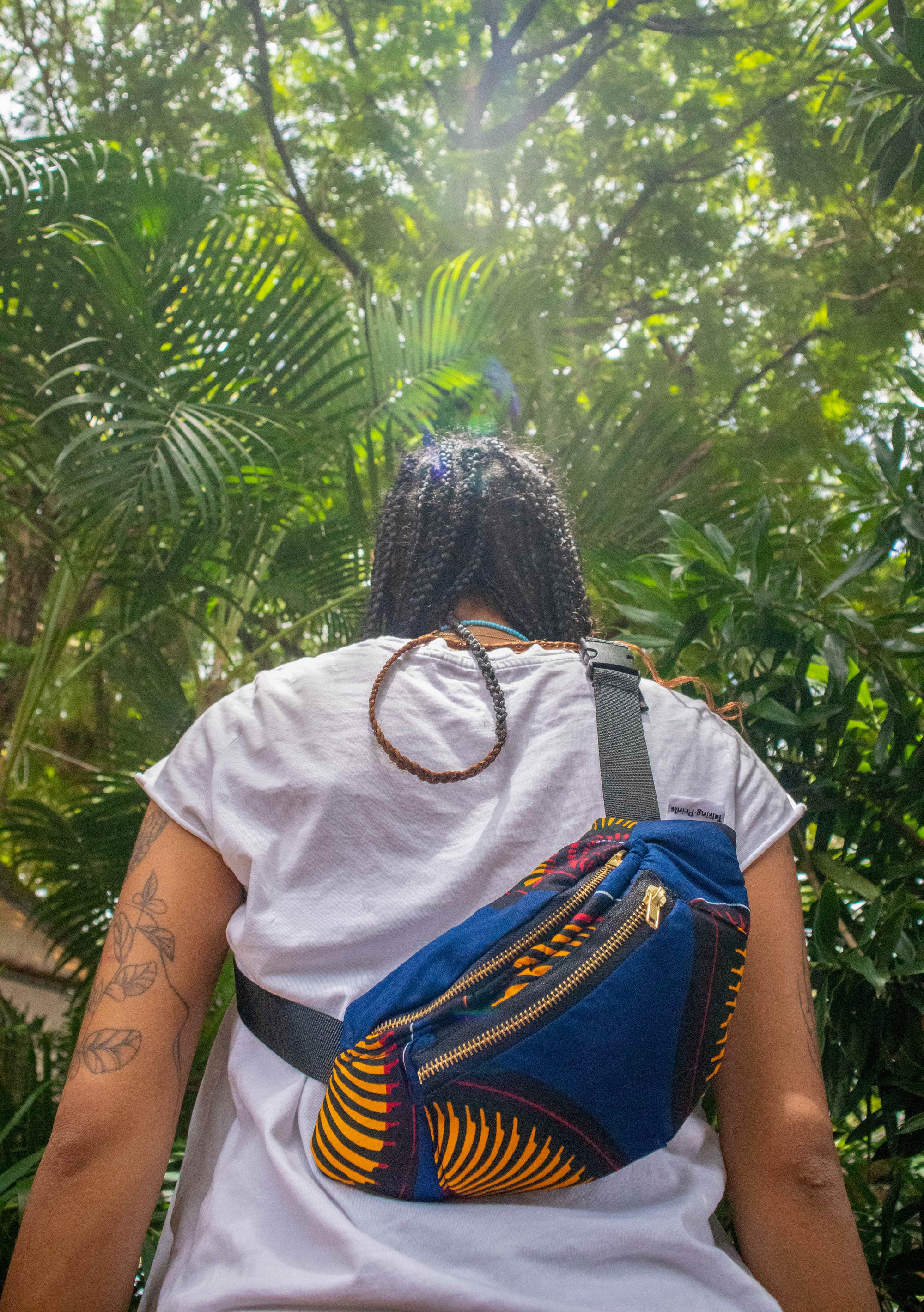 Cotton fanny pack front view in black with zipper closure and compact design